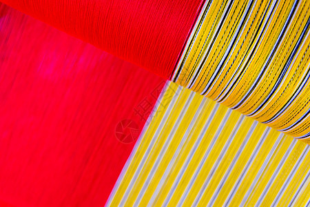 传统的手工编织式传统风格少数民族织物文化编织村庄劳动棉布衣服织机制造业图片