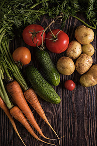 新鲜种植的生蔬菜农业茄子土豆营养黄瓜框架饮食植物叶子篮子图片