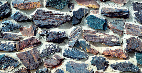 以彩色夸脱墙形式出现的纹理材料制品花岗岩陶瓷矿物化石裂缝边界建筑学矿石图片
