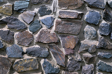 以彩色夸脱墙形式出现的纹理墙纸花岗岩裂缝栅栏马赛克矿石石英岩花园风格材料图片