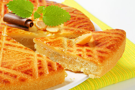 荷兰奶油蛋糕Boterkoek食物面包巧克力甜点蛋糕盘子圆形杏仁图片