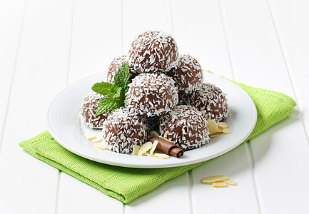 巧克力椰子球雪球曲奇餐巾甜点棉花椰丝酥皮绿色盘子糖果图片