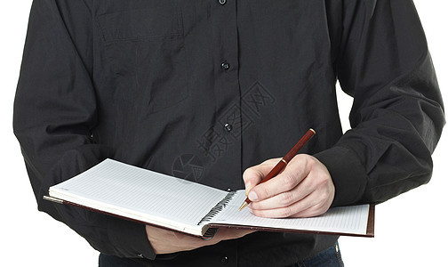 商务人士在注纸中注意到人士手机工人男性笔记工作电话员工笔记本桌子图片