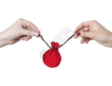 两只手握着两个女人手 拿着圣诞礼物袋礼物织物惊喜红色解雇白色秘密装饰品展示季节图片