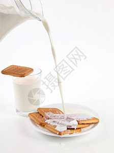 孤立的牛奶和饼干早餐液体蛋糕谷物杯子营养产品酸奶奶制品食物图片