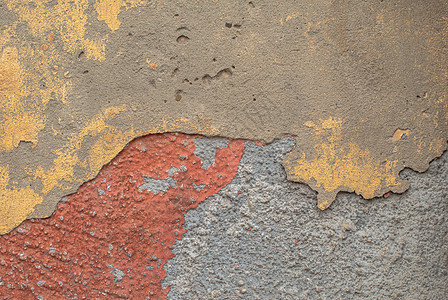 有老石膏的混凝土墙被打碎了 抽象混凝土 风景样式 难看的东西混凝土表面 伟大的背景或者纹理象牙橙子棕褐色艺术蓝色建筑学胭脂红水泥图片