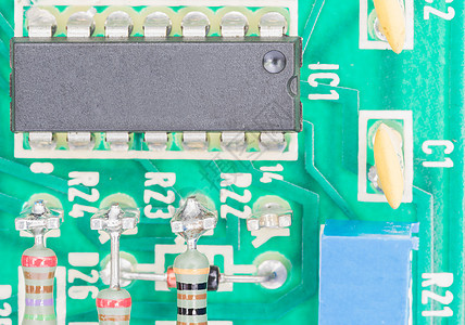 电路板上的冷凝器和阻力组装打印电气绿色电感电容器制造业微电路芯片电子硬件图片