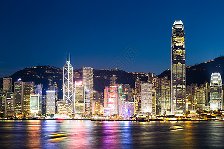 香港市晚上建筑办公室建筑学摩天大楼港口海洋渡船日落城市速度图片