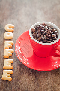 配红咖啡杯的咖啡字母饼干面包棕色糕点框架小麦食物字体黄色红色营养图片