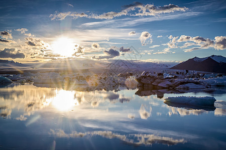 Jokulsarlon冰川湖融化冰山旅游冰川蓝色天空太阳旅行海洋图片