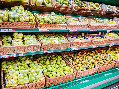 超市货架上新鲜水果产品生产顾客市场零售杂货店商业店铺大卖场绿色图片