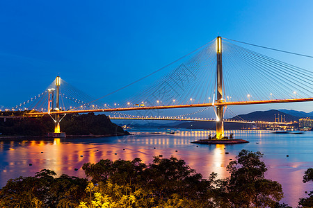 香港的停机桥爬坡运输日落海岸天际地标街道海洋通道图片