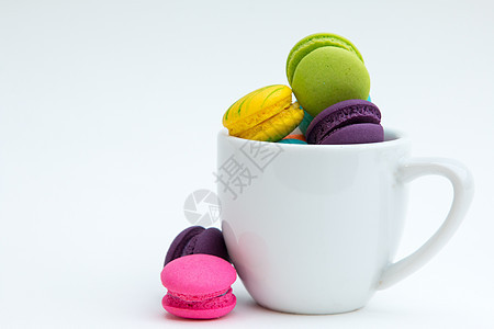 白色背景上多彩的漫画蛋糕小吃甜点糖果巧克力咖啡绿色饼干食物粉色图片