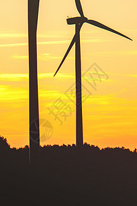 日落时风涡轮机活力环境桅杆创新天空技术螺旋桨蓝色旋转刀片图片