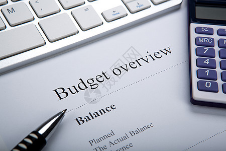 文档标题为预算概览和键盘 计算器报酬统计外表工作首都商业储蓄数据经济文件夹图片
