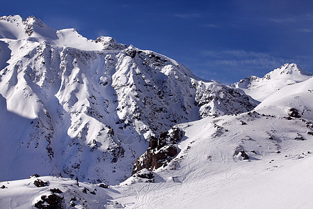 埃尔布鲁斯山太阳蓝色冰川登山阳光旅游爬坡土地冻结旅行图片