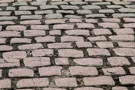 人行道上的砖虫或砌砖虫拍摄角度 i岩石小路花园地面季节橙子街道材料城市石头图片