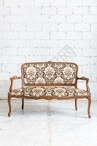 棕色沙发沙发家具木头房间工作室装潢闲暇织物衣服椅子古董背景图片