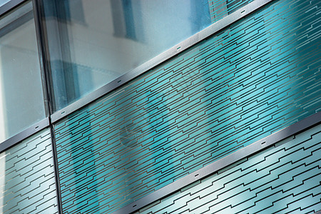 建筑物的玻璃反射镜居住分区分割片段天蓝色水晶建筑设计线条玻璃窗住宿图片