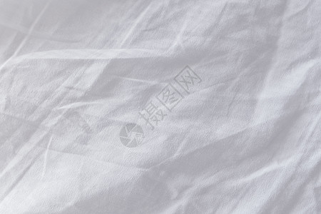 作为背景的皱巴巴的床单纹理材料涟漪帆布织物寝具棉布白色折痕海浪被单背景图片