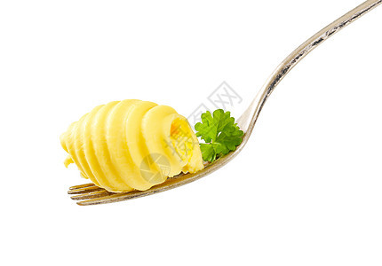 叉子上的黄油卷曲盘香菜刀具食物传播黄油金属食品奶制品图片