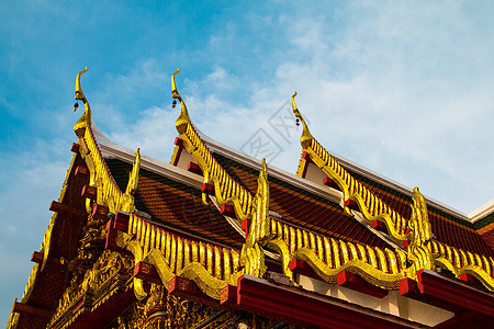佛教教会顶层屋顶金子雕像蓝色宗教佛教徒旅游天空艺术建筑物旅行图片