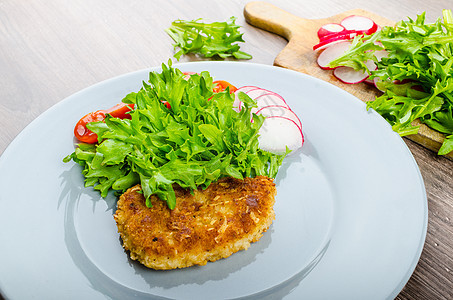 帕米桑奶酪面包猪排蔬菜面包屑草药美食小吃猪肉餐厅食物午餐啤酒图片