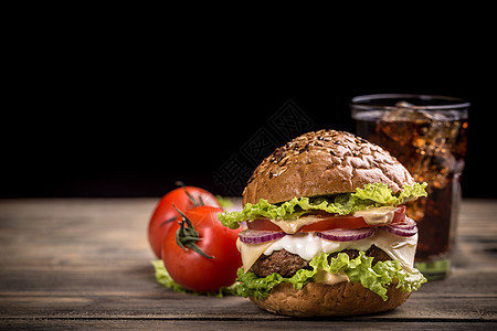 汉堡包洋葱蔬菜包子黑色食物背景图片