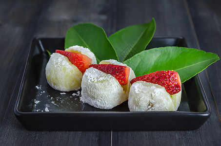 日式日本甜点白色营养食物文化红色年糕水果小吃叶子面包图片