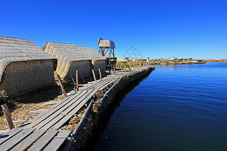 漂浮群岛 Uros 秘鲁提喀卡湖建筑文化独木舟工艺芦苇房屋岛屿旅行旅游木头图片