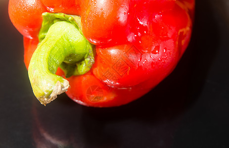 黑色背景的红胡椒营养美食蔬菜食物厨房烹饪饮食小吃辣椒水果图片