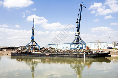 港口起重机和废金属起重基础设施释放加载交通重量运输后勤工作海洋图片