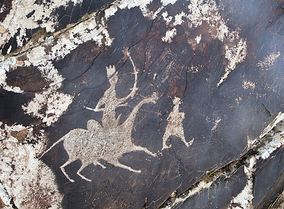 乌兹别克斯坦Sarmishsay的Petroglyph撒娇历史性悬崖精神国家地标岩画公园艺术历史图片