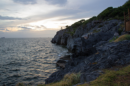 晚上好 康布里悬崖岩石日落天空岛屿海浪地标景点旅游图片