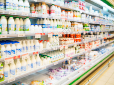 超级超市架的模糊不清店铺购物中心乳白色酸奶产品食物冰箱商品牛奶商业图片