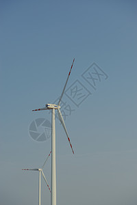 阳光明媚的风涡轮素蓝色涡轮生产风车自然绿色农场气候力量天空图片