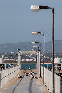 库拉特拉岛的脚桥海浪港口日光海景海滩天桥码头航海海岸线支撑图片