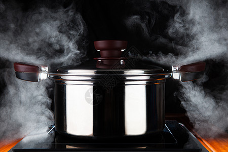 煮饭锅蒸汽背景图片