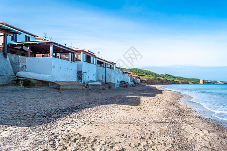 从普拉塔莫纳海滩的海景晴天风景支撑太阳海岸海浪旅行假期海岸线蓝色图片