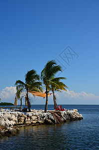 安静的地方旅行旅游天空热带海滩椅子风景晴天岩石海湾图片