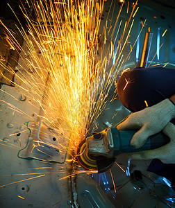 铁工厂加工车间的金属切割工具 c和工程力量机器生产火花磨床工作焊接工业工程师背景