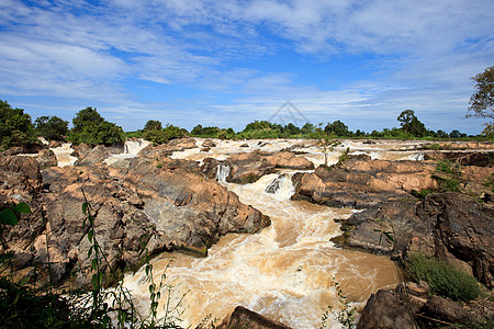 南边Cacamasak的河水倒下或Mekong河热带旅行丛林溪流假期天空里皮石头旅游瀑布图片