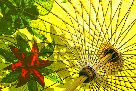 竹木伞制成的竹木手上彩色绘画结构背景图片