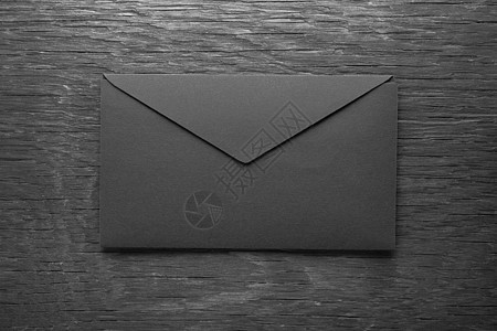 黑木桌上的信封邮政文档公司木头邮件黑色办公室空白卡片商业图片