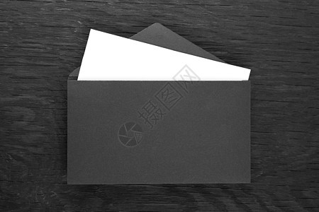 黑木桌上的信封空白桌子邮政邮件卡片商业公司笔记黑色文档图片