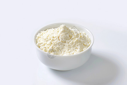 小麦面粉碗淀粉用途粉末糕点食物盘子烘烤白色地面谷物图片