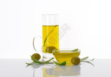 橄榄油美食玻璃水果黄色静物液体玻璃杯食物树叶器皿图片