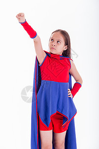 穿着超级英雄服装的姑娘举起手臂胜利领导者优胜者女孩力量喜悦孩子蓝色戏服童年图片