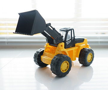 特写玩具轮装入器推土机道路车辆挖掘机机械拖拉机童年前端运输卡车图片