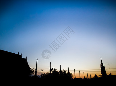 日落的光影日出建筑蓝色寺庙橙子天空日光坡度阴影时间图片